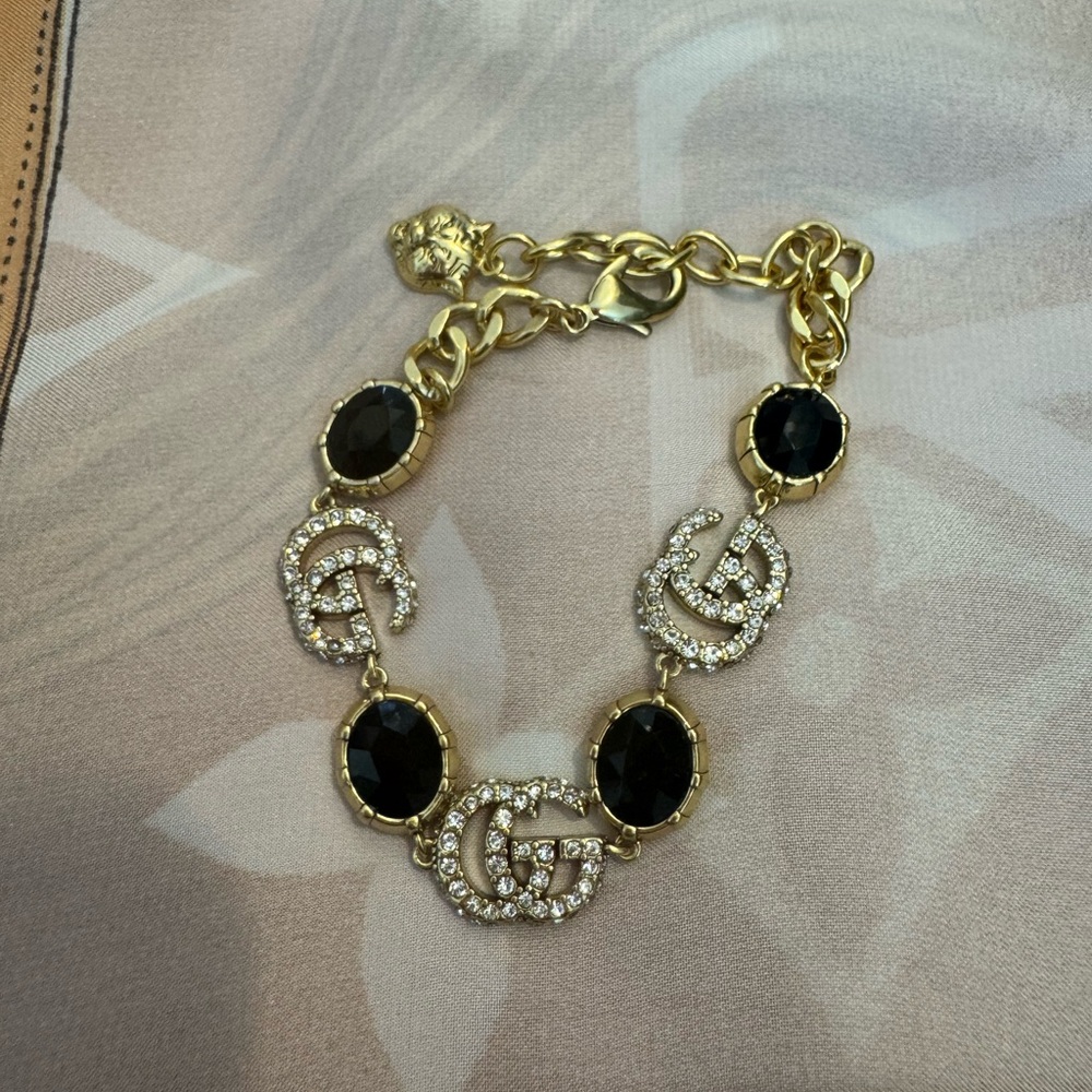 Gucci GG Marmont Crystal Elegant Gold and Black Bracelet
